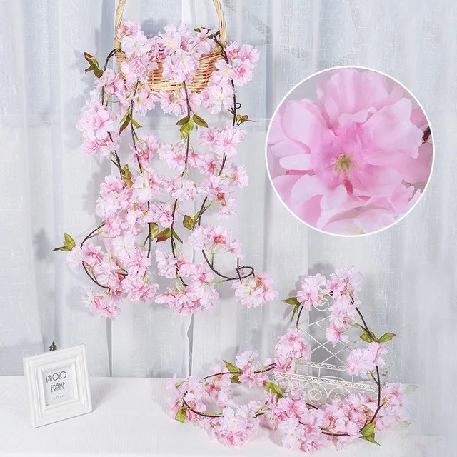 Description Picture 2 of itemArtificial cherry flower vine flowers fake blossoms garland ivy hanging vine home party DIY green leaves hoetl beautiful decor