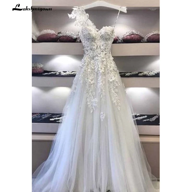 one shoulder tulle wedding dress