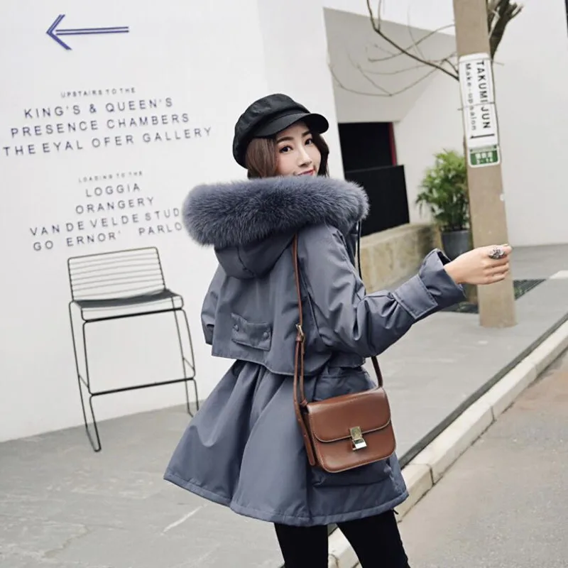 

2019 tooling down jacket women's long section thickening new loose large fur collar Velcro large size White duck down coat