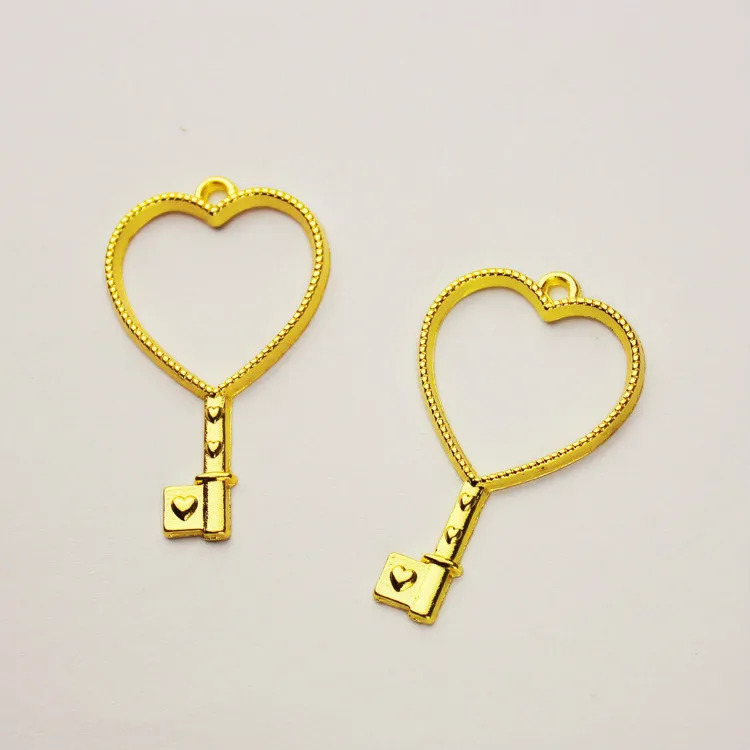 

UV Resin Open Backed Bezel Metal Frame Pendant Golden Heart Charms Bezel Setting Cabochon Setting Mold Jewelry Making Tools