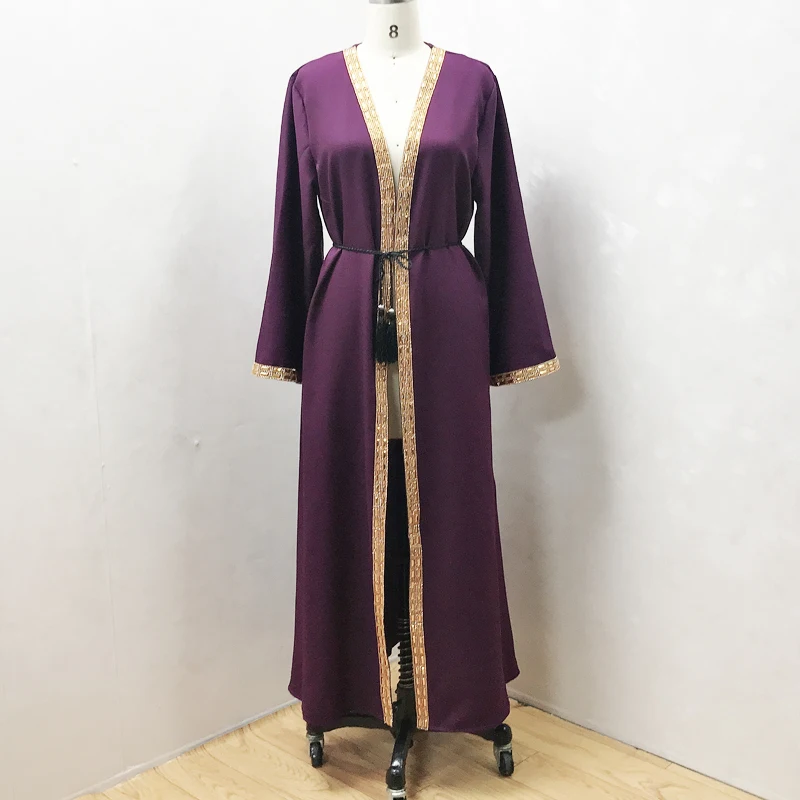 

New Dubai-based Middle East African fashion with gold sequined Muslim cardigans