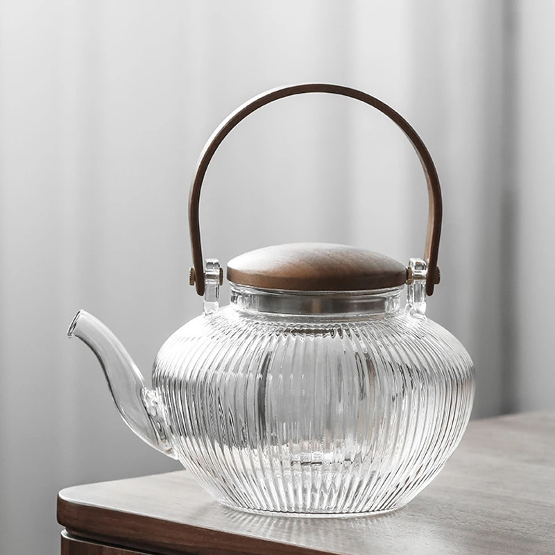 https://ae01.alicdn.com/kf/H34659a03534f40ceb40a0b12112243e4X/800Ml-Gong-Fu-Tea-Set-Electric-Tea-Kettle-Womb-Tea-Milk-Oolong-Tea-Infuser-Chinese-Glass.jpg