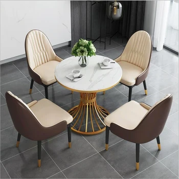 

Postmodern light luxury fashion marble round dining table simple creative firm stainless steel dining table negotiation table