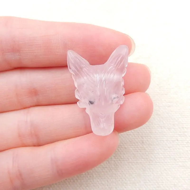 Натуральный камень розовый кварц вырезанная вручную голова волка боковая