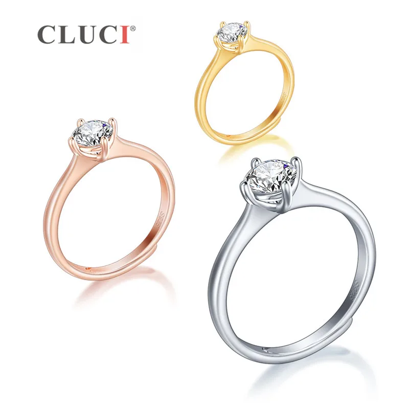 Серебряное классическое обручальное кольцо CLUCI 925 пробы с четырьмя крапанами из