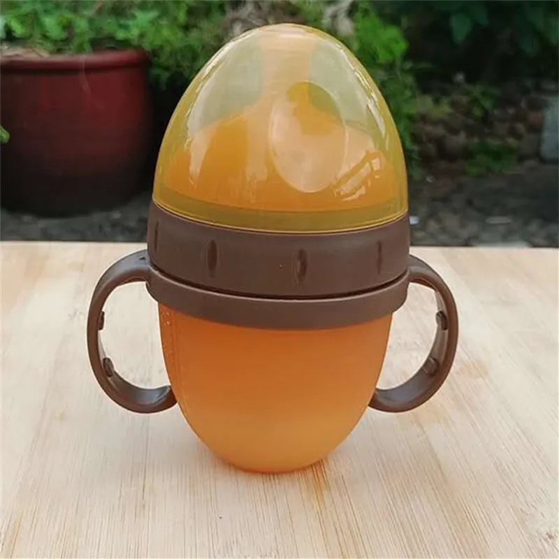 

Belle Kang Wide Mouth Silicone Nursing Bottle with Handle BABY'S Feeding Bottle Mother Sense Silica Gel + Word Hole Pacifier Pro