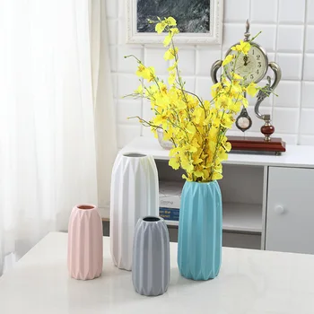

Modern simple origami ceramic vase colored powder grey blue yellow white large, medium and small floral arrangements