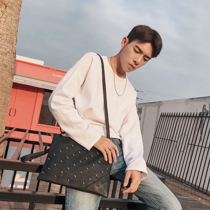 

Men's clutch bag high quality Korean rivet trend ipad shoulder bag 2019 new JIULIN
