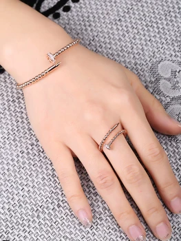 

Trendy Design Women's Punk 2 Pcs Bracelet & Ring Set Simple Nail Design Open Adjustable Cuff Bangle Jewelry Set Nail Ring Gift