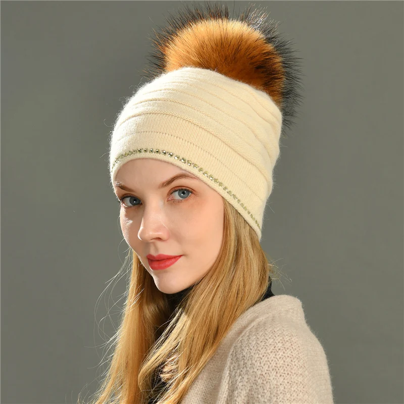 

Jaxmonoy Women's Cashmere Knitted Beanie Hat with Real Raccoon Fur Pom Pom Autumn Winter Rhinestone Hemming Warm Female Bonnet