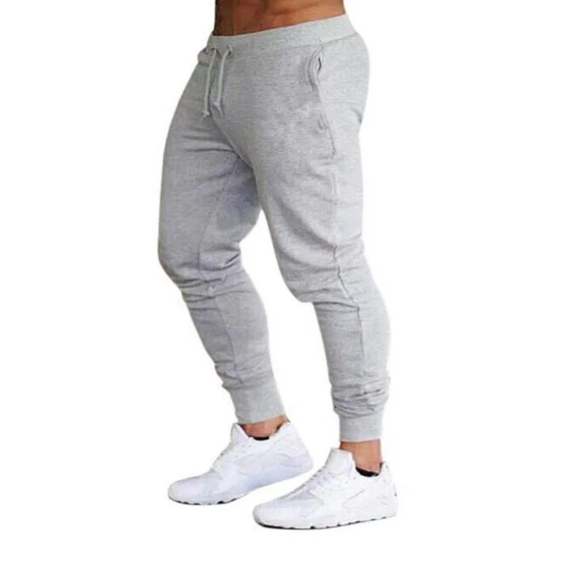 Pantalones de chándal deportivos para hombre, pantalón de correr para gimnasio, chándal de algodón, pantalones ceñidos para culturismo, novedad