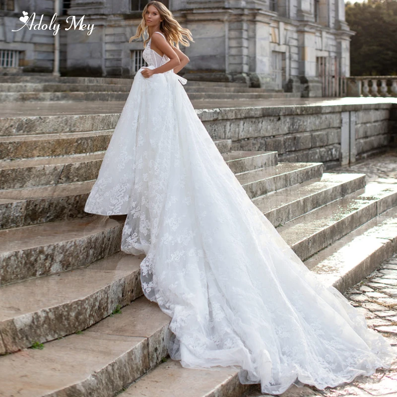 

Adoly Mey Gorgeous Appliques Chapel Train A-Line Wedding Dresses 2020 Luxury Beaded V-Neck Lace Up Princess Bride Gown Plus Size