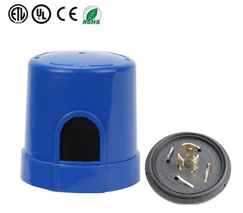 

ANSI C136.41 dimmer light controller base assembly sleeve and upper cover light control element interface