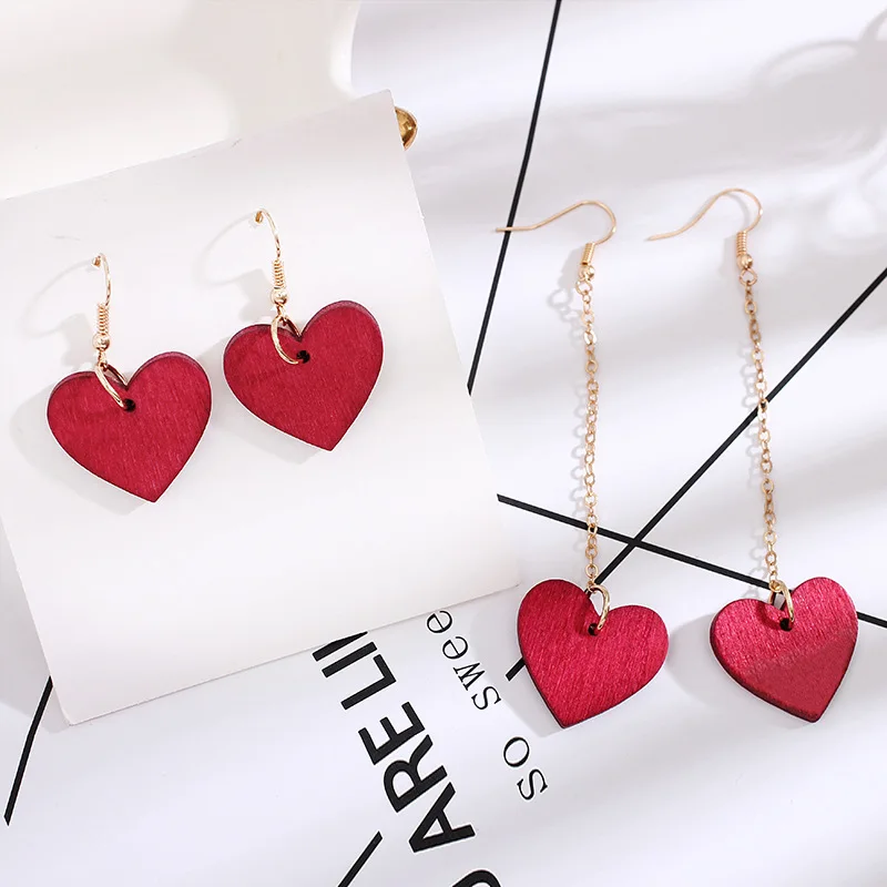 

Korean Temperament Simple Charm Sweet Girl Love Geometric Heart-shaped Earrings Solid Wood Ear-free Ear Clip Ear Studs