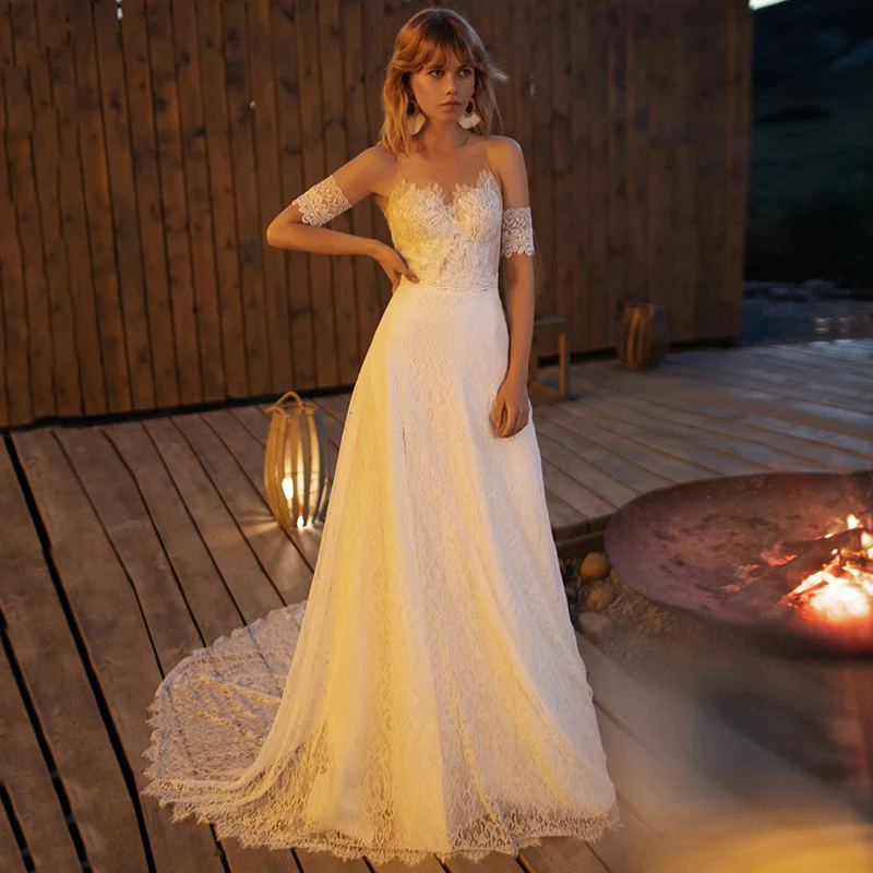 

Lace A-line Wedding Gowns 2020 Charming O-neck Applique Sweep Train Button Back Sleeveless Bridal Dresses