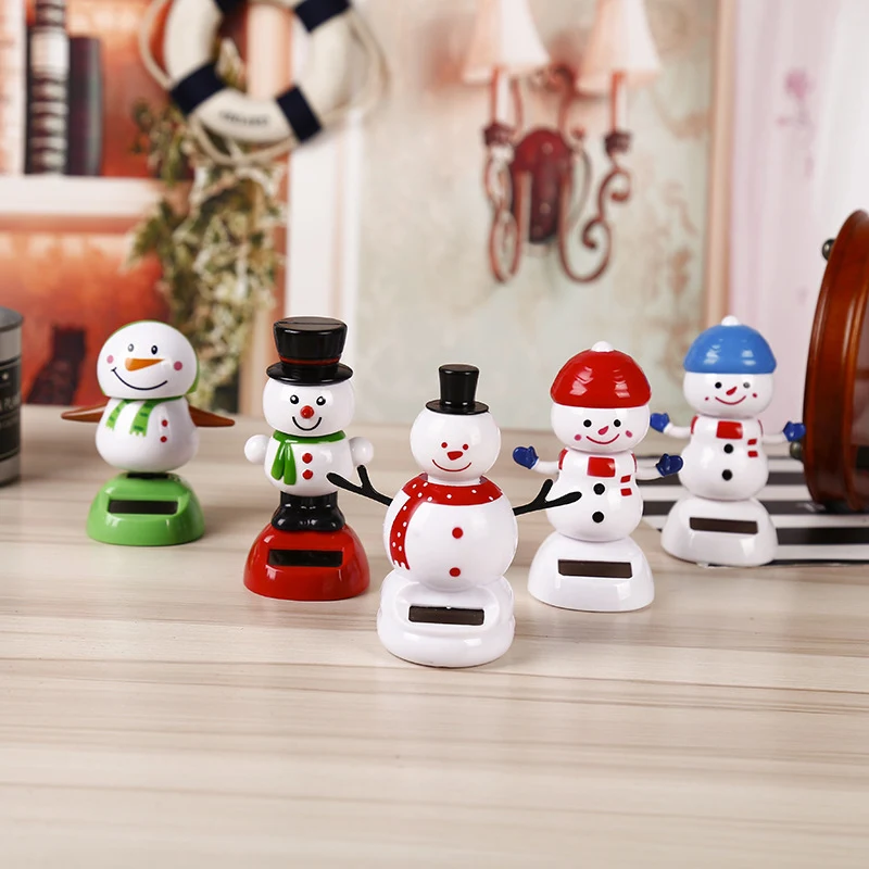 

11cm Santa Claus Elk Snowman Solar Shaking Head Action Figure Anime Penguin Angel ABS Toy Christmas Gift Car Interior Decoration