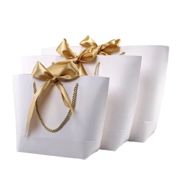 

Large Size Gold Present Box For Pajamas Clothes Books Packaging Gold Handle Paper Box Bags Kraft Paper Gift Bag With Handles