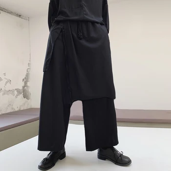 

INCERUN 2020 Men Wide Leg Pants Drawstring Punk Style Joggers Plain Baggy Irregular Trousers Pockets Men Harem Pants Streetwear