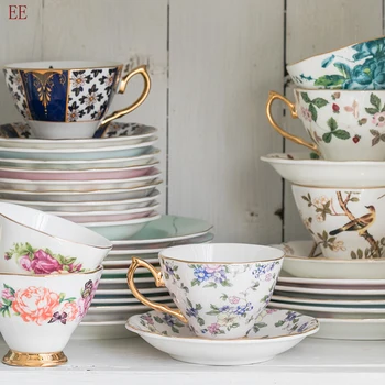 

Porcelain Black Tea Cups Set Royal Luxury Coffee Cup Bone China Saucer Golden Yellow Flower Teacup Taza Cafe Taza Grade Design