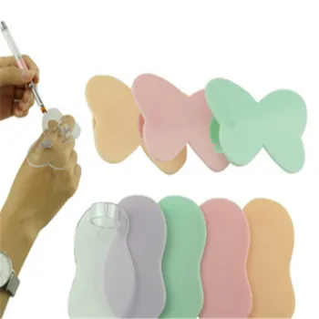 

Nail Art Paint Palette Color Holder Finger Ring Design for Acrylic UV Gel Polish Nails Dishes Showing Mixed Makeup Tools