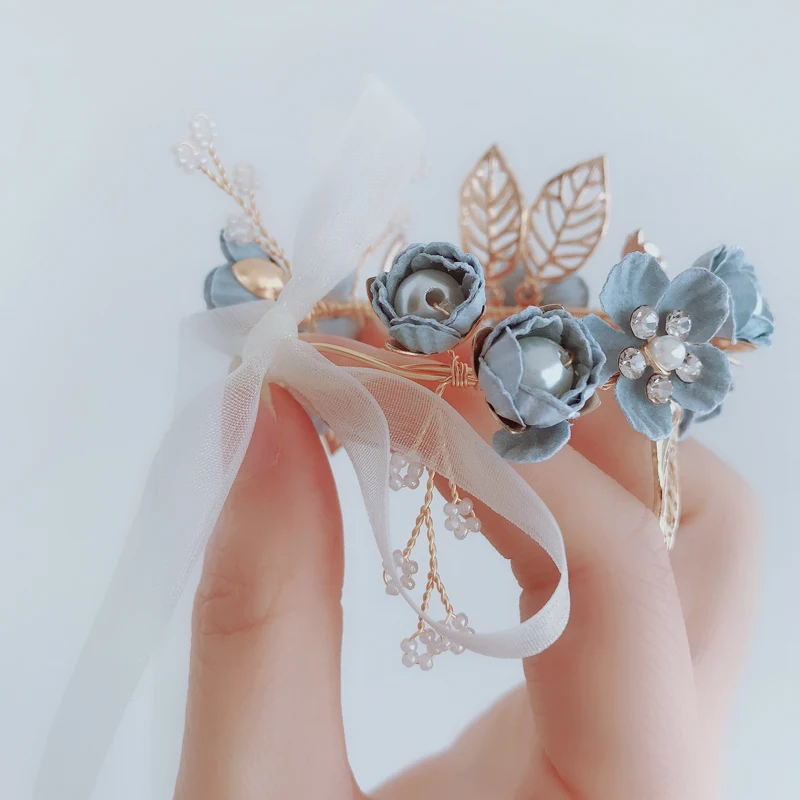 

Girlish fresh exquisite beautiful little flower ice cream color bracelet wrist flower bride bridesmaids sister group wedding