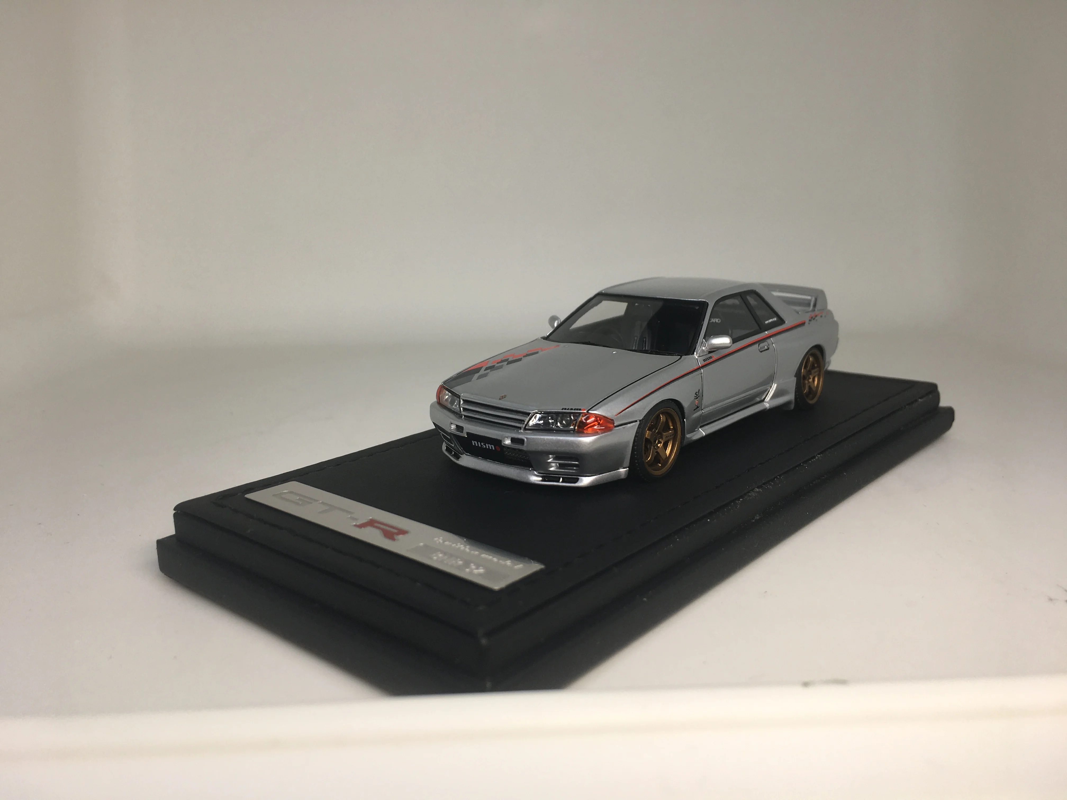 Модель зажигания 1/43 Nissan Skyline GT-R R32 Nismo S-мелодия (серебро) IG0959 модель автомобиля из