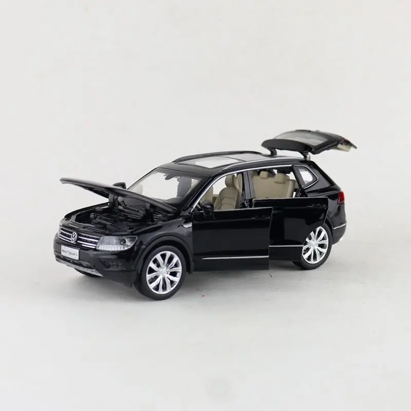 Масштаб 1:32/литая металлическая игрушка/внедорожник Volkswagen Tiguan спортивный