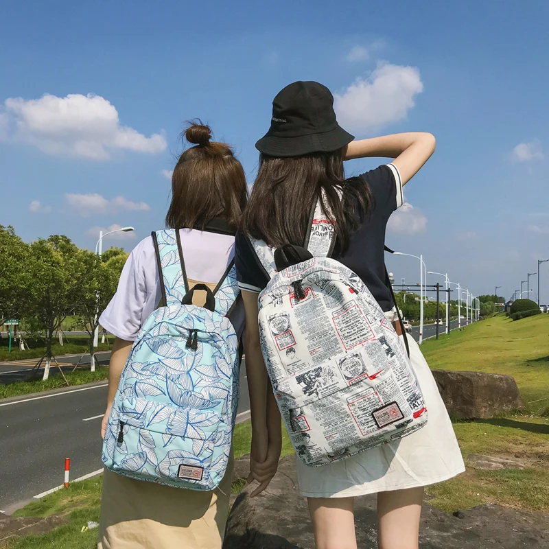 

Design canvas backpack female Korean Harajuku ulzzang school junior high school student bag ins flowers backpack computer bag