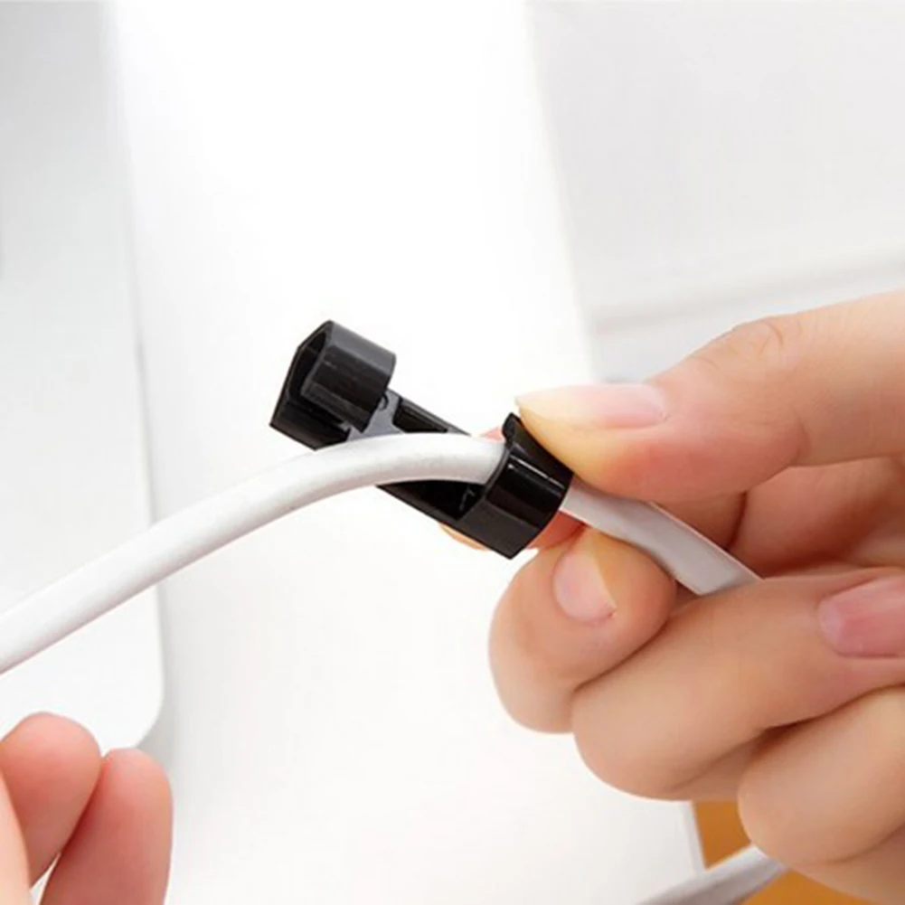 20Pcs Adhesive Data Cable Charging Wire Holder Clips Wall Desktop Cord Organizer peeling and fitting, using adhesive glue.