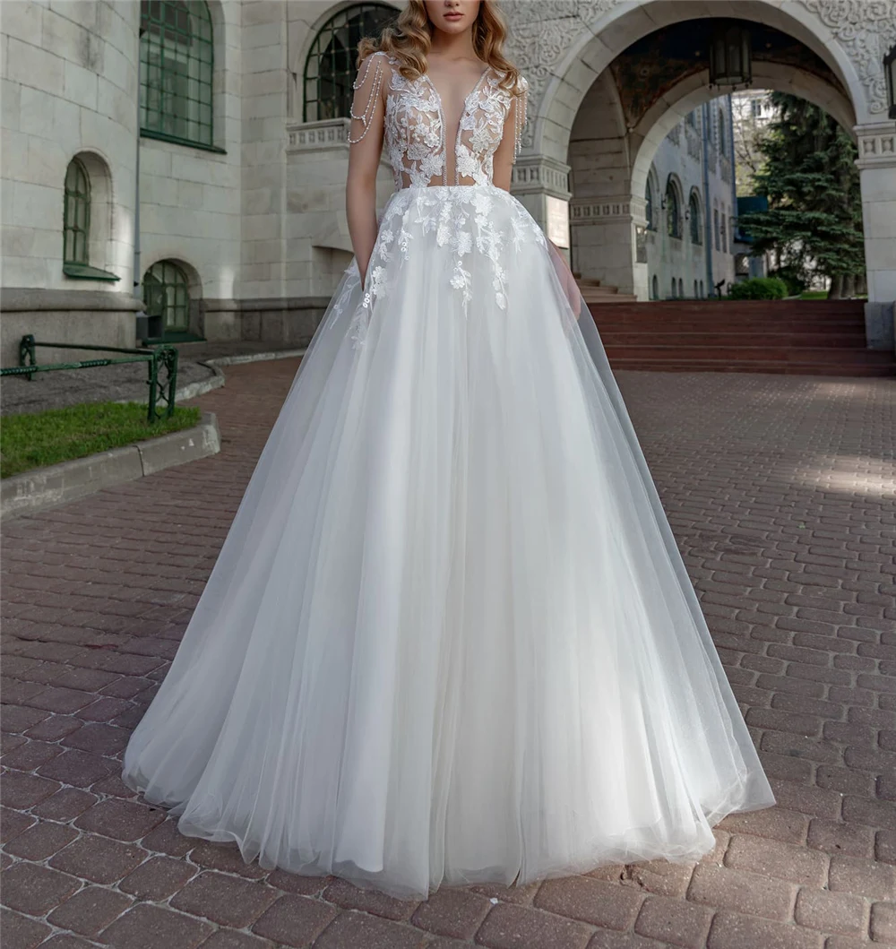 Romantische Witte Sexy Diepe V-hals Bruidsjurken Kapmouwtjes Tulle Parels Kralen Custo Gemaakt Prinses Rijk Vestidos De novia 2020 Romantische Witte Sexy Diepe V-hals Bruidsjurken Kapmouwtjes Tulle Parels Kralen Custo Gemaakt Prinses Rijk Vestidos De novia 2020