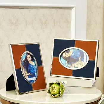 

Nordic Light Luxury Metal Oval Photo Frame Set Up Living Room Bedroom Model Room Stitching Leather High-end Decorations Gifts