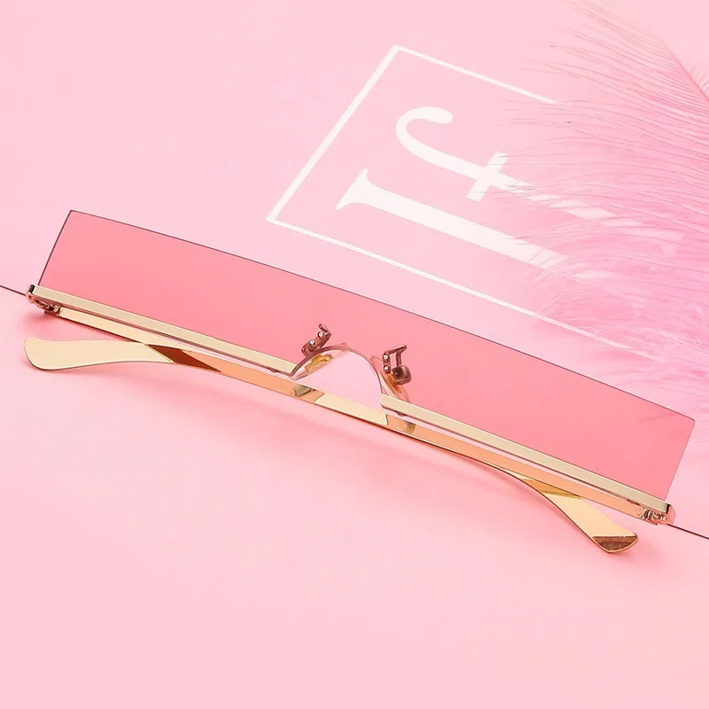 

New personality rimless sunglasses rectangular small frame glasses fashion street shooting men and women the same sunglasses