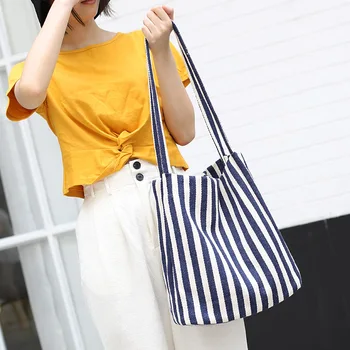 

Korean version of the simple canvas bucket bag wild small fresh striped handbag casual forest literary shoulder messenger bag...