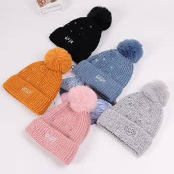 

Baby boy girl hat Korean children embroidery five-pointed star knit hat autumn and winter 1-4 years old baby wool hair ball cap