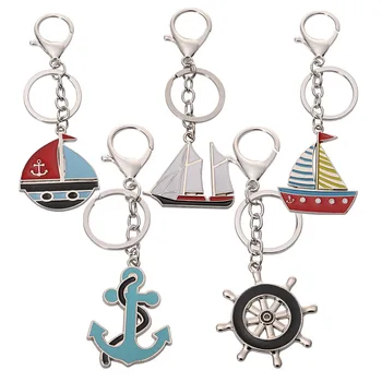 

FREE SHIPPING BY DHL 100pcs/lot New Metal Ship Sailboat Keychains Zinc Alloy Ship Anchor Rudder Keyrings for Gifts