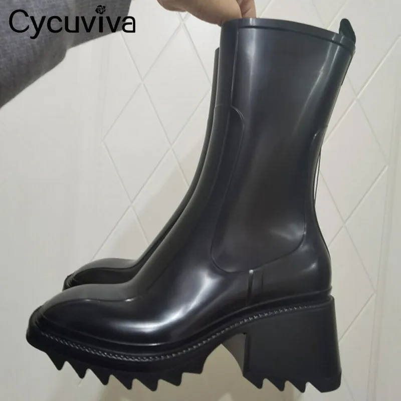black designer rain boots