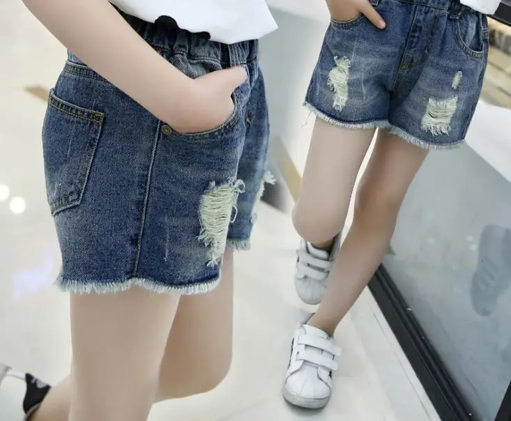 

Niuzai 2020 spring and summer new product big girl's wash hole jeans short pants children's hot pants trend