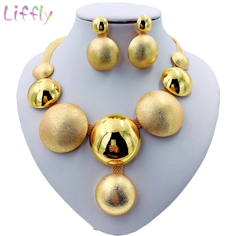 pulseira brincos e anéis com pedras redondas