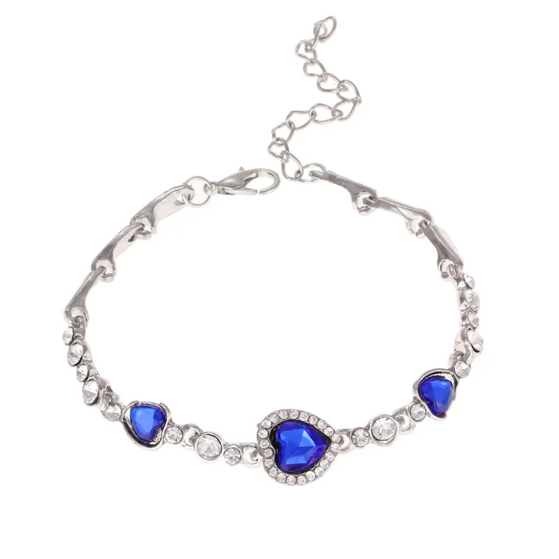 Браслет с кристаллами циркония в форме сердца персикового цвета | Украшения и