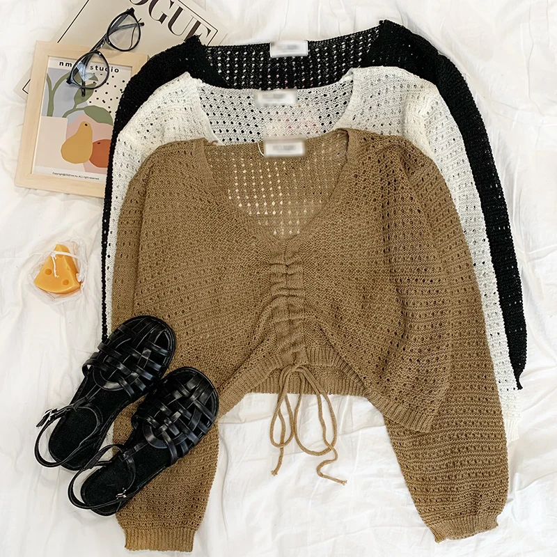 

Autumn retro hollow out drawstring strap design temperament V-neck loose long-sleeved sweater