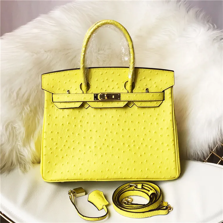 

Genuine Leather Woman Package Original Edition Skin Pink Colour Ostrich Grain Package Hand Bill Of Lading Shoulder Package 25cm