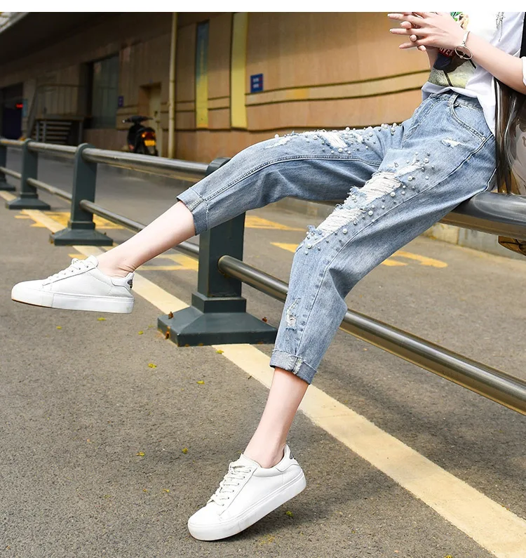 Free shipping women's 2020 new summer thin section eight-point jeans plus size ripped loose harem pants women's fashion