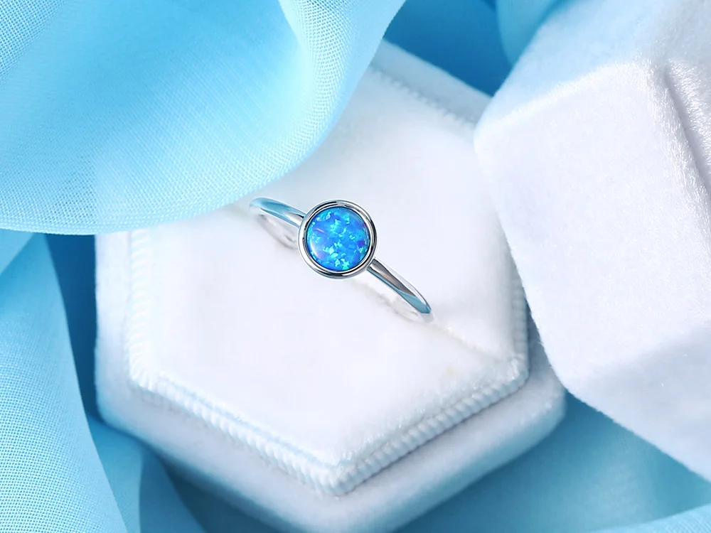 ZHOUYANG Opal Stone Rings For Women Simple Classic Round White Gold Color Party Birthday Gift For Girls Fashion Jeweley DZR032 ZHOUYANG Opal Stone Rings For Women Simple Classic Round White Gold Color Party Birthday Gift For Girls Fashion Jeweley DZR032