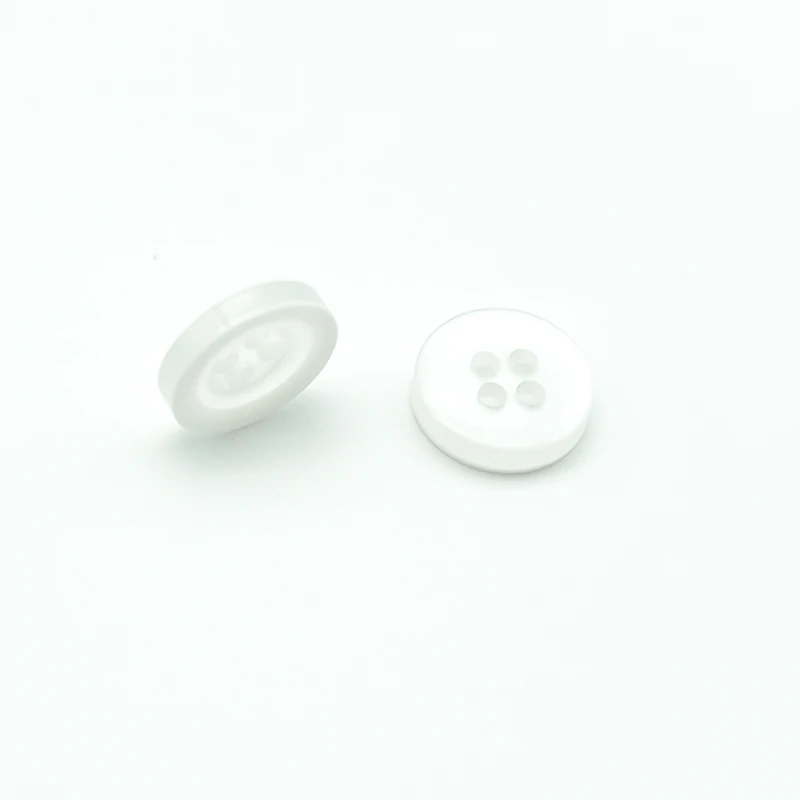 

Wholesaleable Resin Buttons 100pcs/package Round Four Holes white Buttons For Coat Suit Cotton Clothing DIY Fashion Decoration