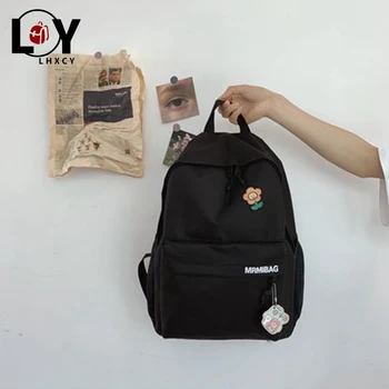 

Flower pendant Oxford Textile Small fresh womens backpack Leisure Waterproof travel backpack Korean version Designer School Bag