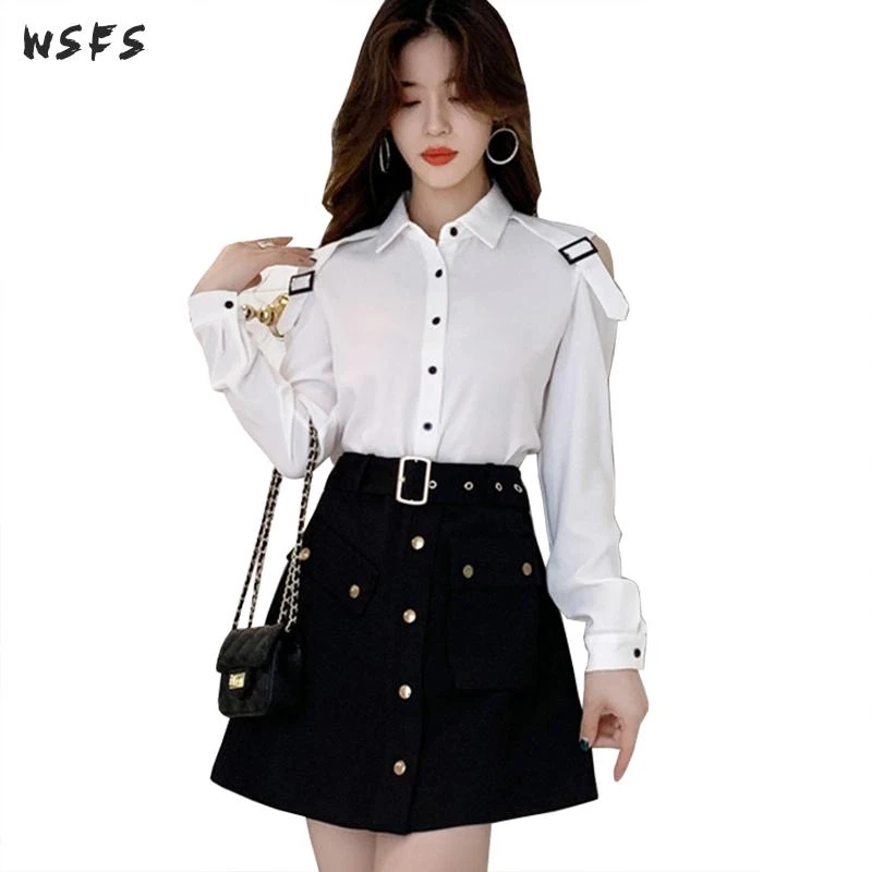 white top and black skirt dress