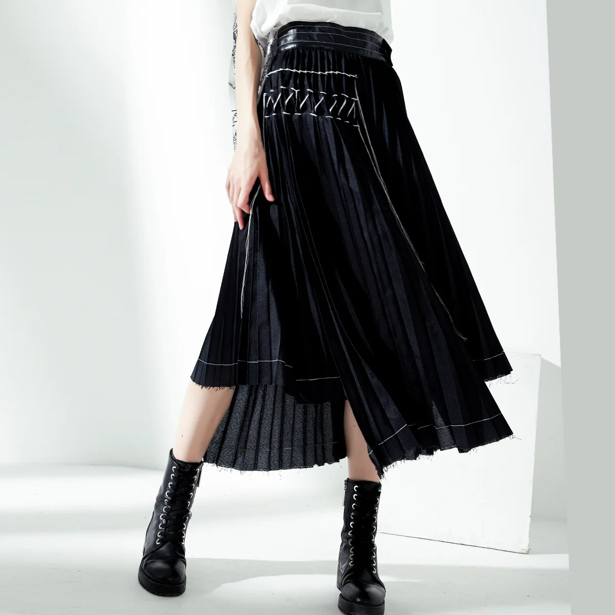

2019 Autumn Winter Pleated Skirts Women Black Patchwork Leather Waist Designer Irregular Aline Skirt Female High Street Skirts