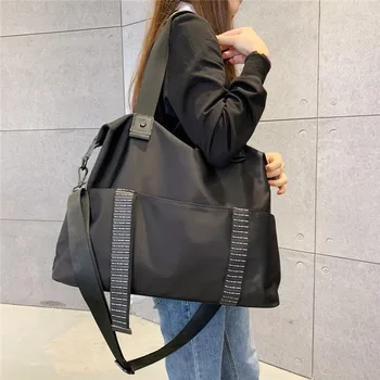 

2020 new travel bag female portable luggage shoulder bag Korean large-capacity Oxford cloth bag lightweight travel fitness bag