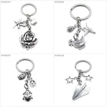 Brelok brelok statek kosmiczny samolot samoloty papierowe gwiazdki Pentagram Bug Beetle biedronka owad kurczak kura kogut ptak koliber(China)