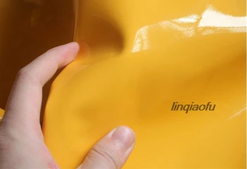 

Mango yellow mirror light artificial leather fabric coated fashion fabric